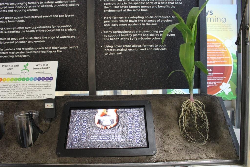 Touchscreen monitor with facts about macronutrients and micronutrients in soil
