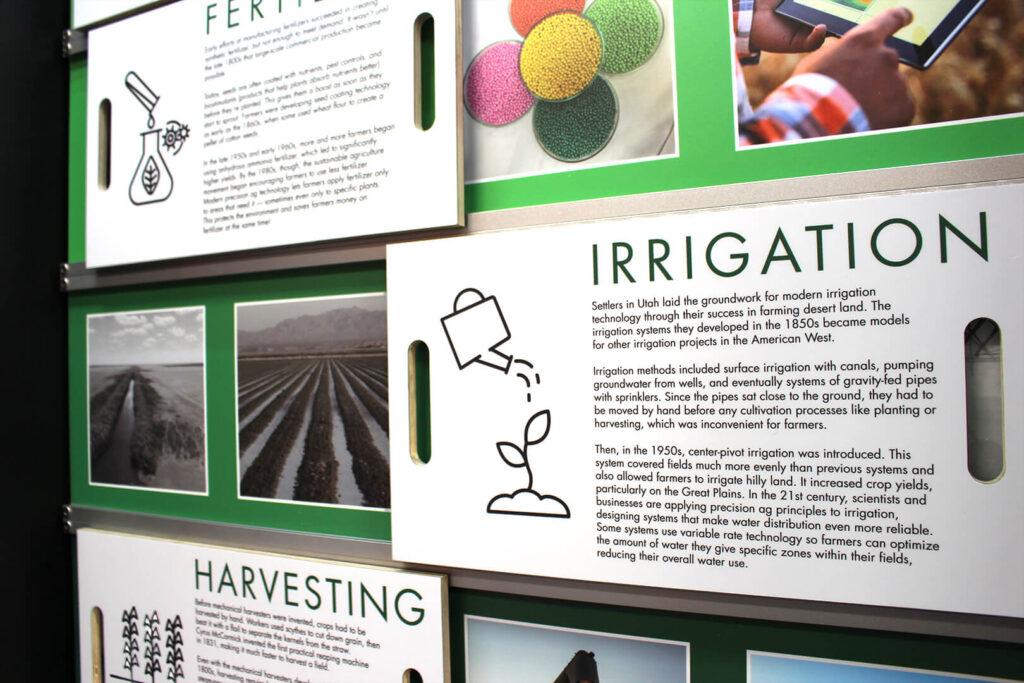 Closeup of info panel about improvements in irrigation technology.