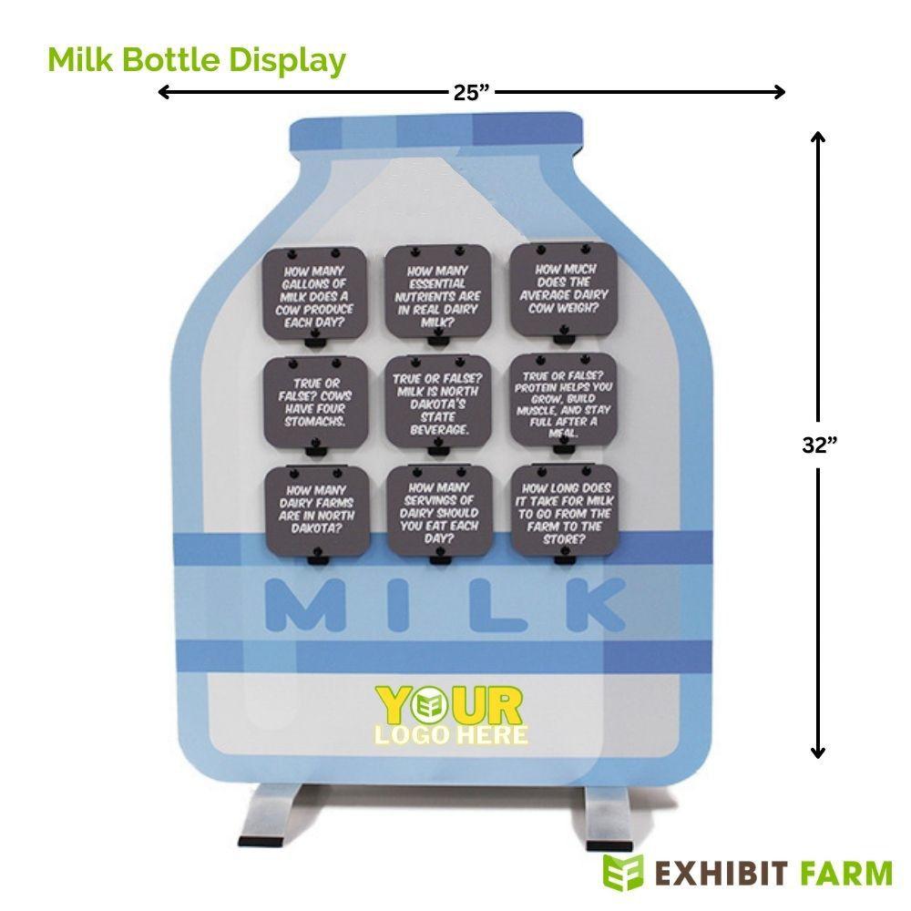 Tabletop milk bottle display with dairy facts
